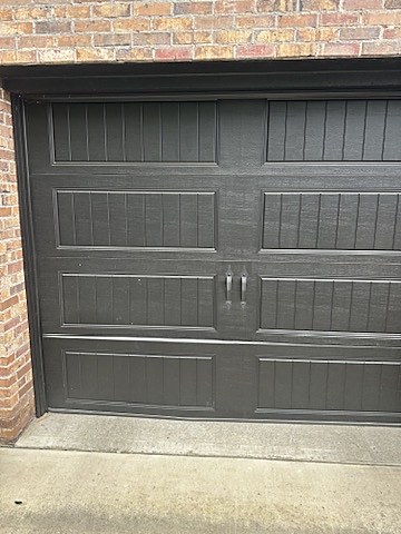 Black carriage-house door installed by NJ Garage in Saddle River, NJ