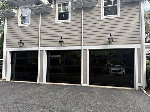 Black full-view glass doors installed by NJ Garage in Demarest, NJ