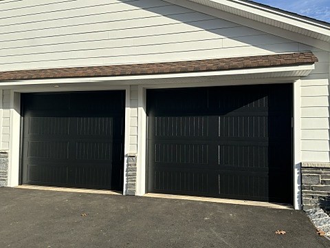 Black ribbed garage doors installed by NJ Garage in Upper Saddle River, NJ