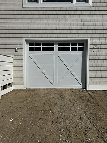 Grey crossbuck carriage-house door installed by NJ Garage in Manahawkin, NJ