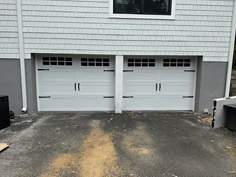 White carriage-house doors with windows installed by NJ Garage in Short Hills, NJ