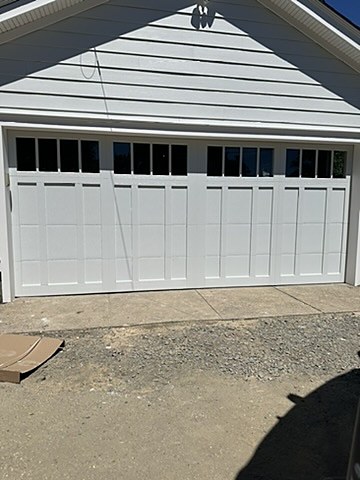 White door with windows installed by NJ Garage in Wyckoff, NJ