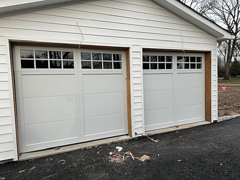 White doors with windows installed by NJ Garage in Allendale, NJ