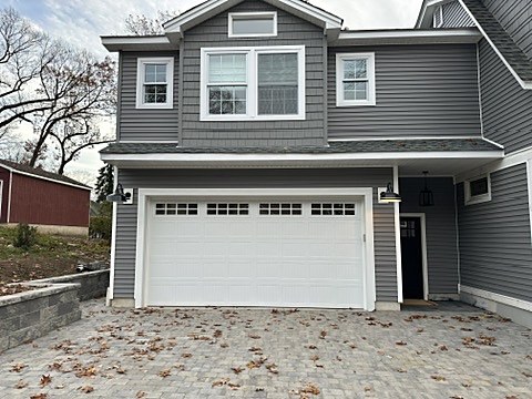 White double door with windows installed by NJ Garage in Hillsdale, NJ