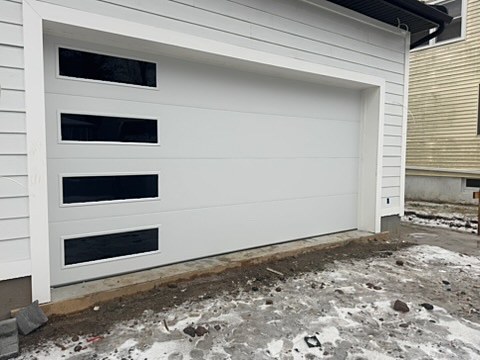 White flush door with long side windows installed by NJ Garage in Livingston, NJ