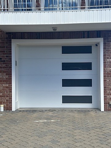 White flush door with side windows installed by NJ Garage in Cliffside Park, NJ