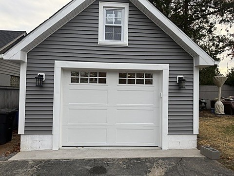 White garage door with window row installed by NJ Garage in Oradell, NJ