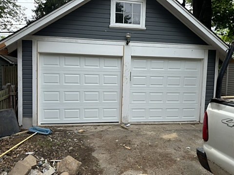 White raised-panel double doors installed by NJ Garage in Montclair, NJ