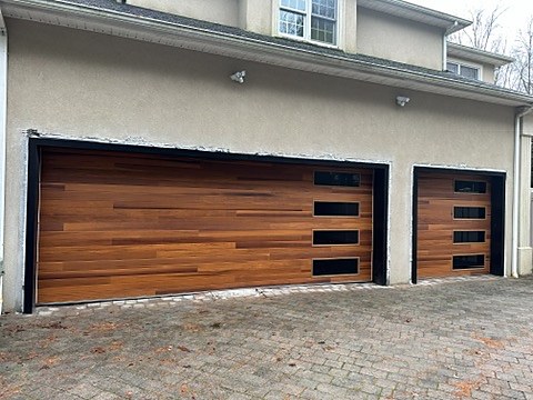 Wood-look flush doors with side windows installed by NJ Garage in River Vale, NJ