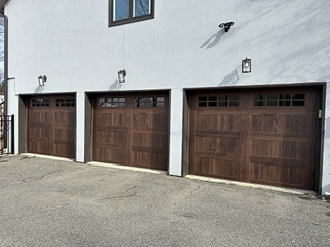Woodgrain carriage-house doors installed by NJ Garage in Montville, NJ